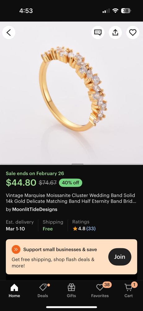 Another angle of the yellow gold vintage marquise moissanite cluster wedding band on Etsy. The shop is owned by MoonlitTideDesigns.