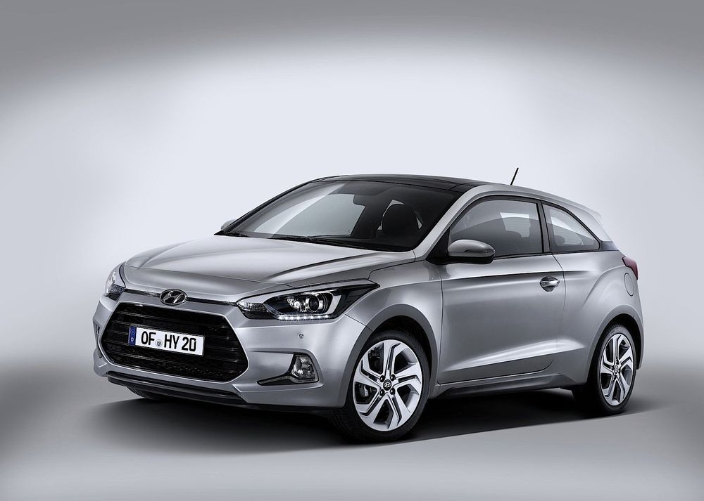 A marketing photo of the Hyundai i20 Coupé in three quarter view. A sporty and compact little car that was a joy to drive.