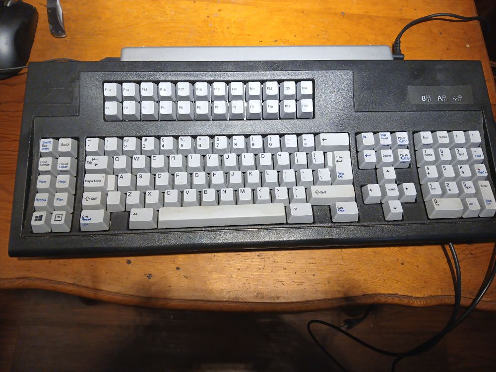 Mechanical 5250 style computer keyboard.