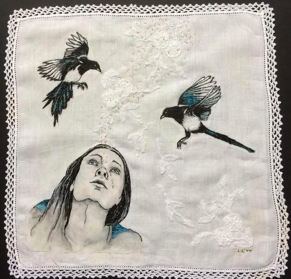Textile art. Woman looking up at two flying magpies.