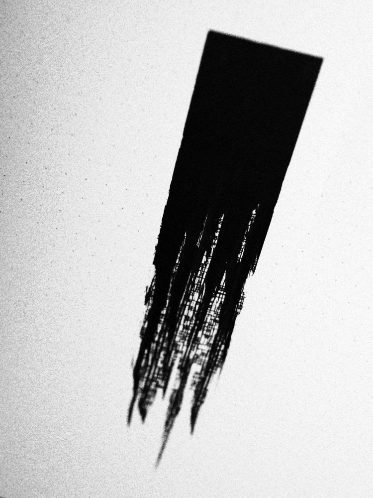 A heavy square brush stroke of black ink resolves partially into small rectilinear asemic forms as it tapers