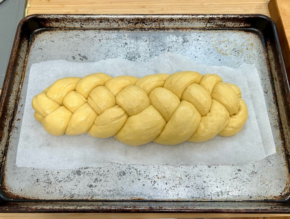 Braided dough on baking sheet 
