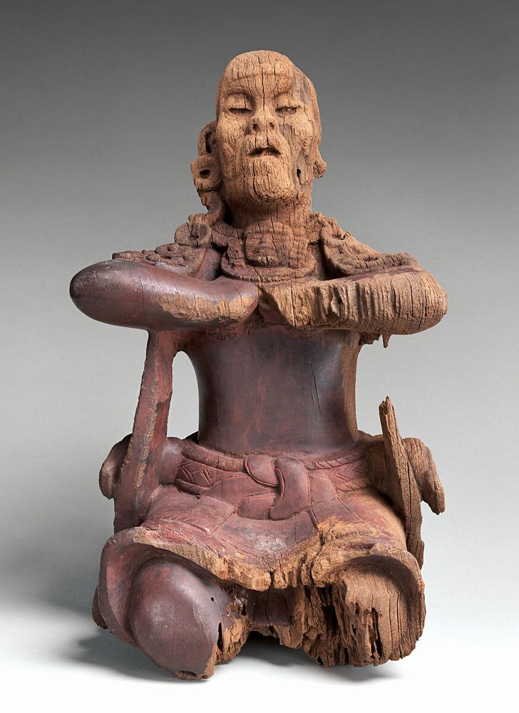 Mirror-bearer
Maya artist(s)
410–650 CE


“This Mirror-Bearer figure is the best-preserved example of portable Maya wood sculpture and one of the highlights of the Early Classic period (ca. 250–550 CE) Maya art. The artist created this figure out of a solid piece of hardwood from the genus Cordia, known locally as bocote. Research determined a radiocarbon age for the wood of 1425 years before present (± 120 years), or a range of 410 to 650 CE. It was said to have come from the border region between Guatemala and Tabasco, Mexico. Most likely, to judge from its extraordinary preservation, the findspot must have been a dry cave or well-sealed funerary chamber. The damage on its left side is the result of some wear or decay in that context, perhaps from resting against a surface or being subjected to varying passage of air.” 

Coloured with hematite 

Title: Mirror-bearer

Artist: Maya artist(s)

Date: 410–650 CE

Geography: Guatemala or Mexico

Culture: Maya

Medium: Cordia wood (bocote), red hematite

Dimensions: H. 14 1/8 x W. 9 x D. 9 in. (35.9 x 22.9 x 22.9 cm)

Classification: Wood-Sculpture

Credit Line: The Michael C. Rockefeller Memorial Collection, Bequest of Nelson A. Rockefeller, 1979

Object Number: 1979.206.1063

Via the Met Museum 
