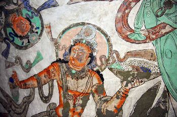 An apsara [Buddhist religious figure] painted on the ceiling of Cave 1 of the ancient Chinese Kizil caves. Greens are mainly dioptase via The Glorious Kizil Grottoes By staff reporter YU XIANGJUN, 2015-September-28, China Today