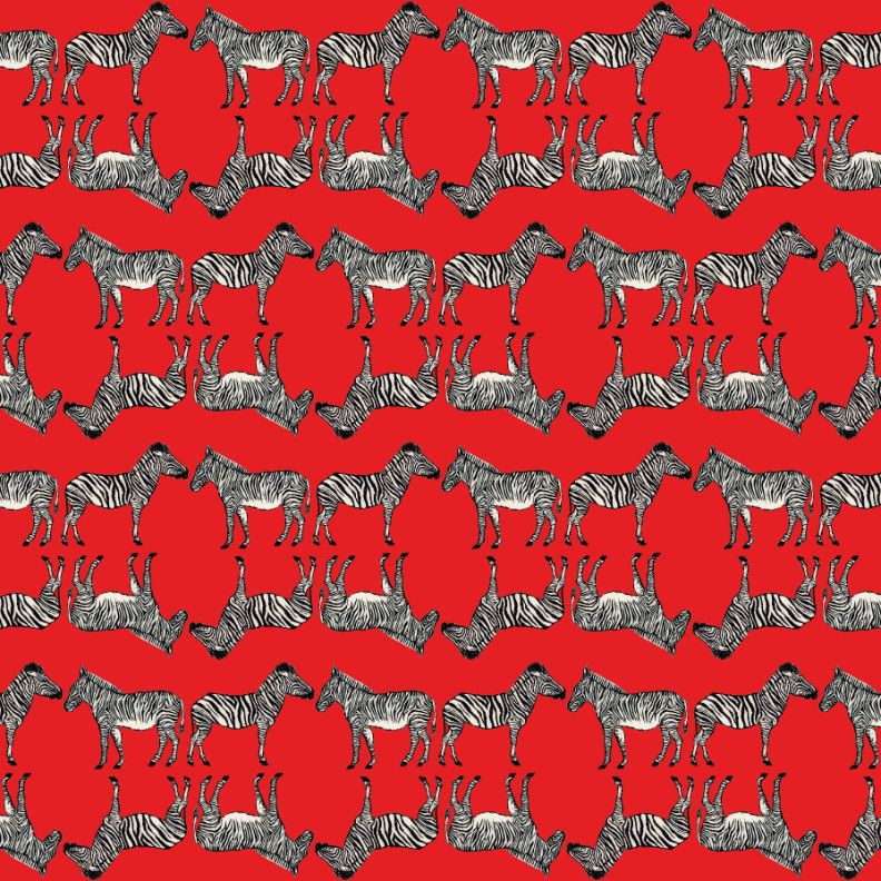 As described this a repeat pattern made with my linocut which juxtaposes two varieties of zebra, Grévy’s and Burchell’s, back to back, and also flipped upside down and replaced, against a red background.