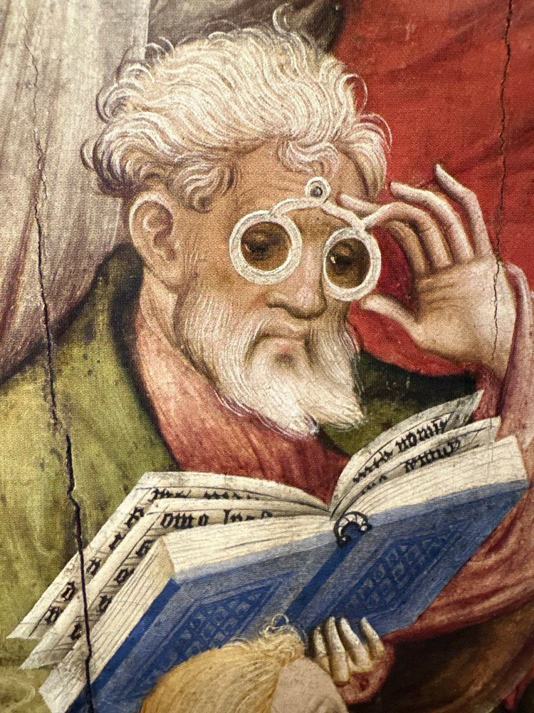 Detail of an apostle with reading glasses in Conrad von Soest’s Niederwildungen Altarpiece