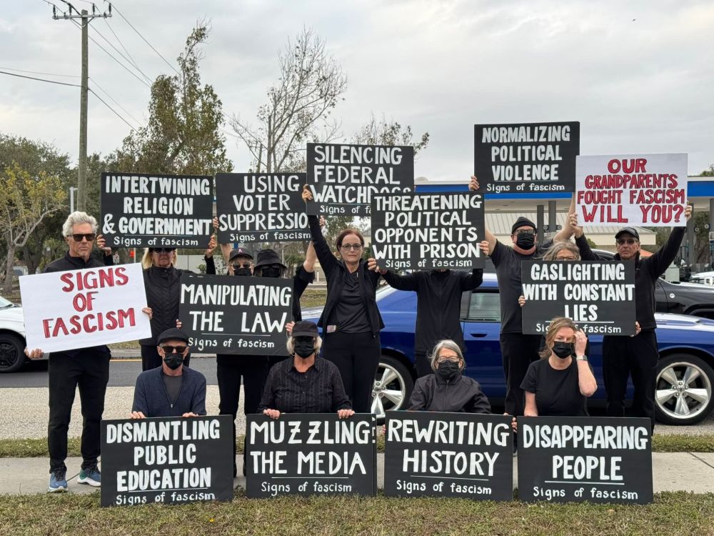 Many signs from protesters recently in Venice, FL