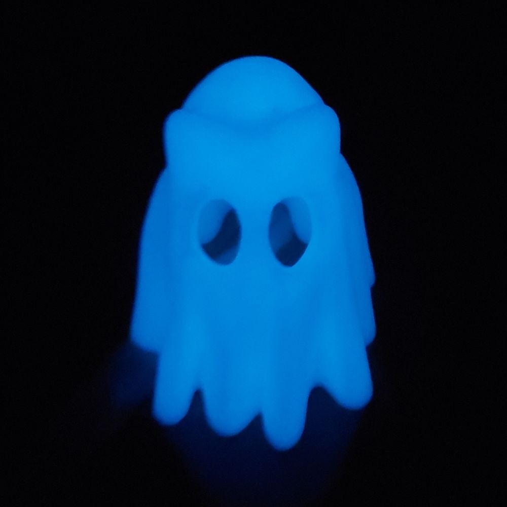 3d print of a ghost that is also a cat - glows as blue in the dark