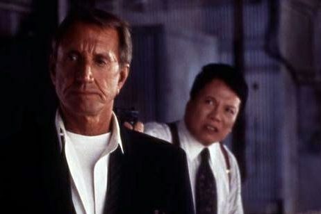 Roy Scheider and Ric Young in CHAIN OF COMMAND (2000)