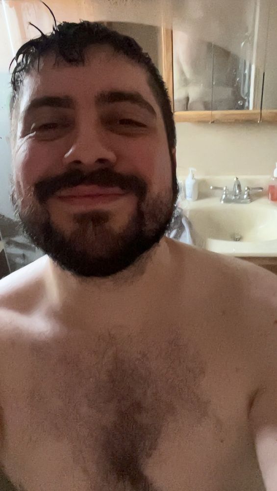 Selfie of myself in the shower with the mirror behind me barely revealing my butt. I, and my butt, look kissable in this picture.