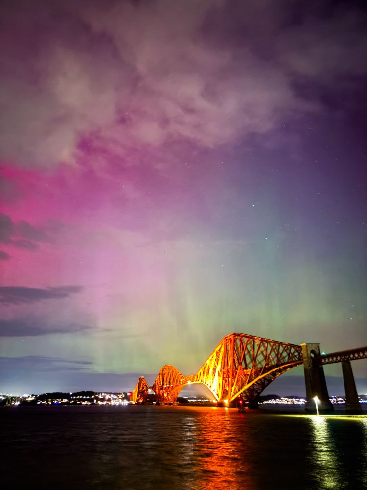 Pink green and purple Aurora over the forth rail bridge 