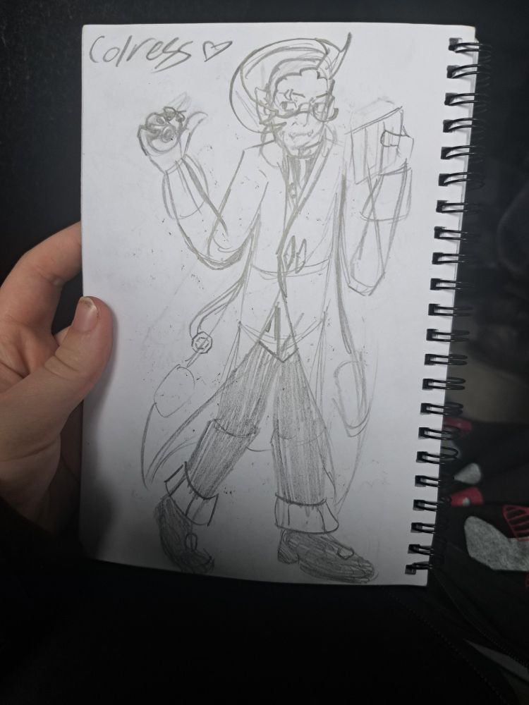 My pencil drawing of Colress. I've included my headcanons (facial scarring and vampire like teeth). I put a heart next to his name because I love him so much 😸