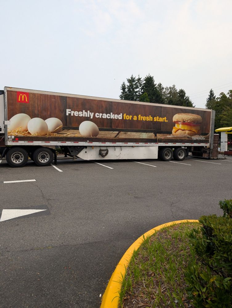 The side of a transportation vehicle that has a very funnily worded message