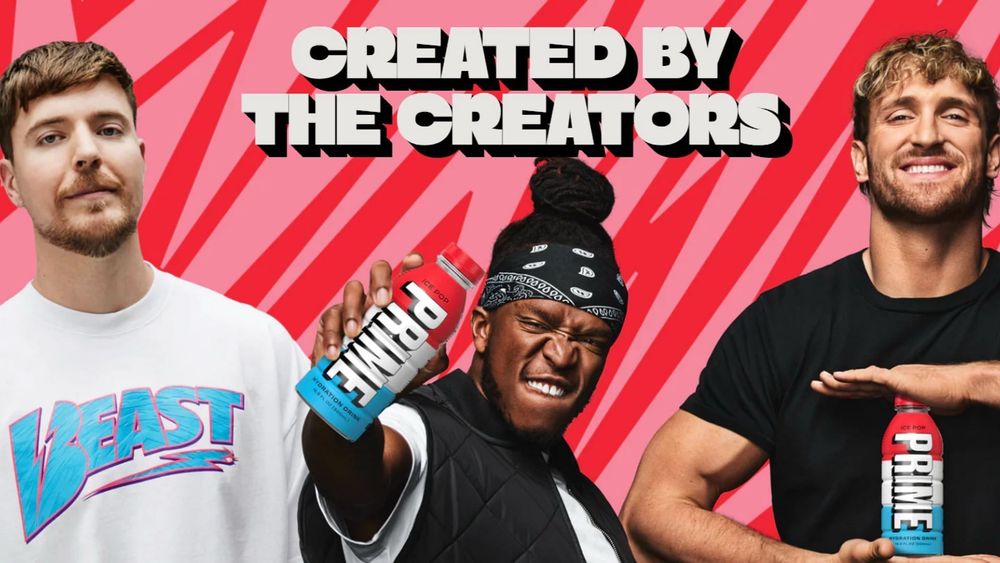 Real promo artwork with the three creators/human disappointments holding Prime bottles on a red background and the text ‘created by the creators’. Ugh. 