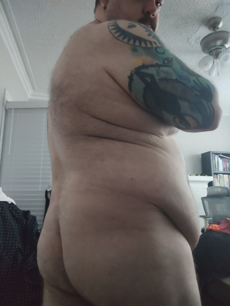 Same chubby man, but from behind