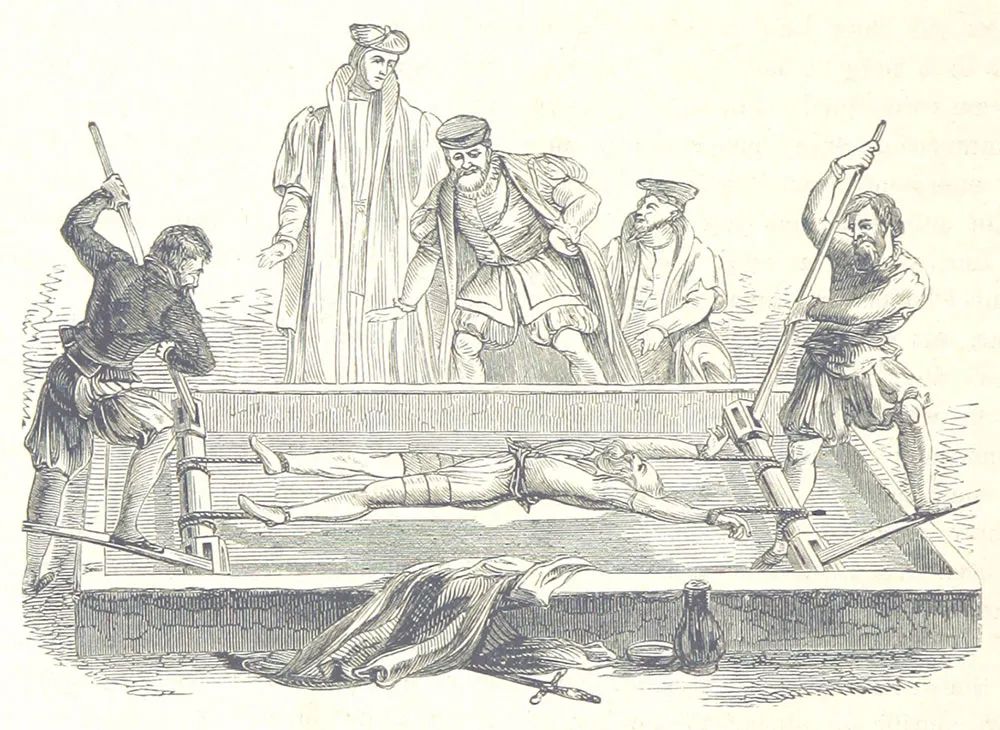 Drawing of a person being tortured by a group of men on a device called “the rack” where the victim is bound laying down on their back, stretched to extremes by the hands and feet
 