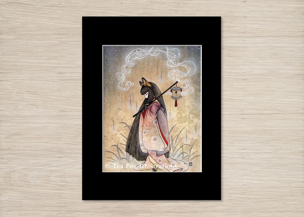 Image shows a print of my painting depicting a fox woman inspired by Japanese folklore surrounded by a black mat with white core. 