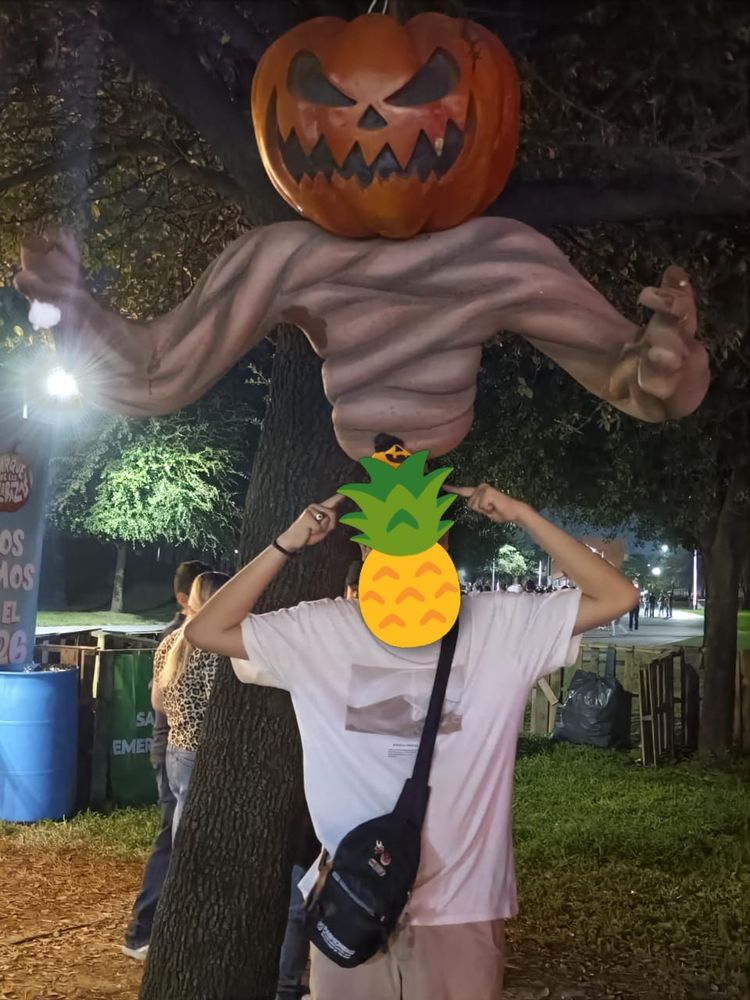 Me pointing a little pumkin dude and a big pumpkin dude