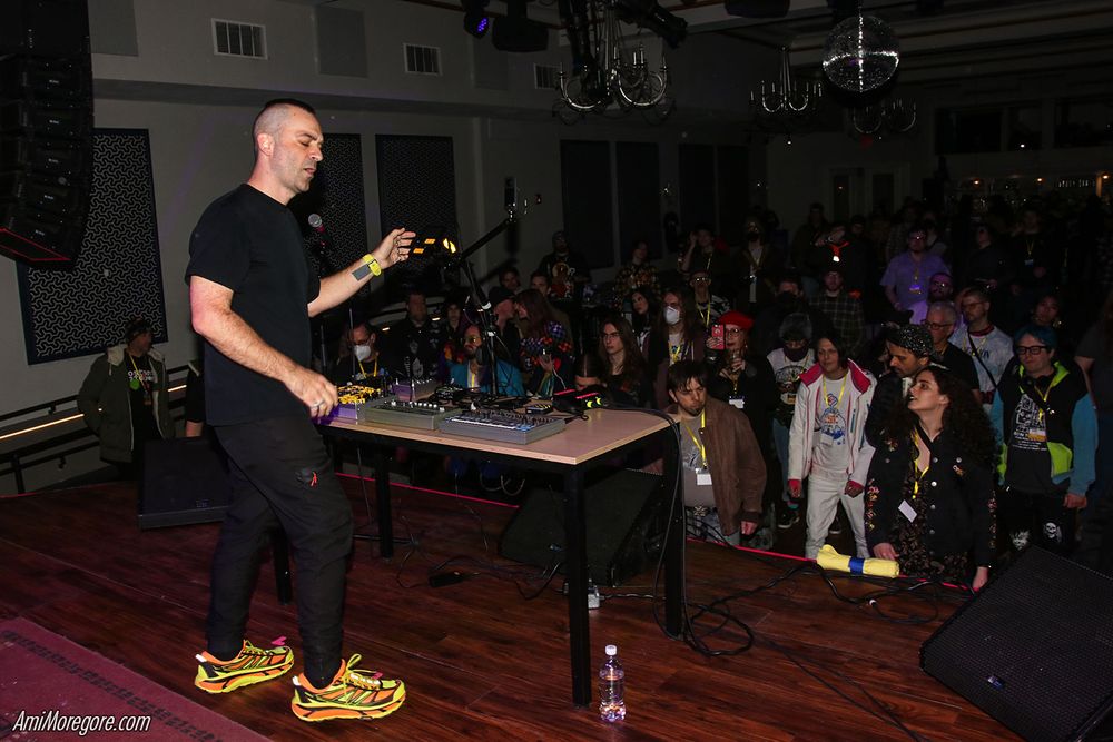 Nullsleep performing on stage in front of a crowd