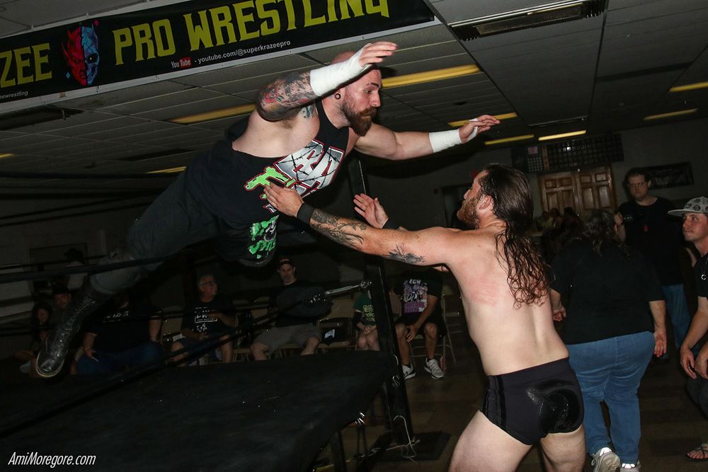 Bam Sullivan dives through the ropes at Austin Luke