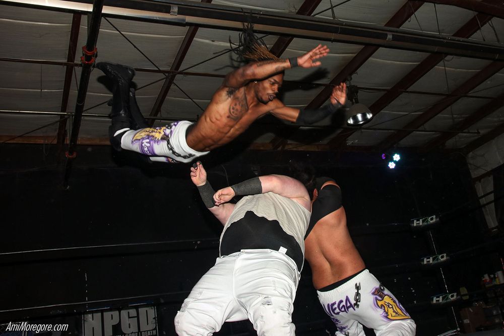 Shaun Smith dives onto opponents