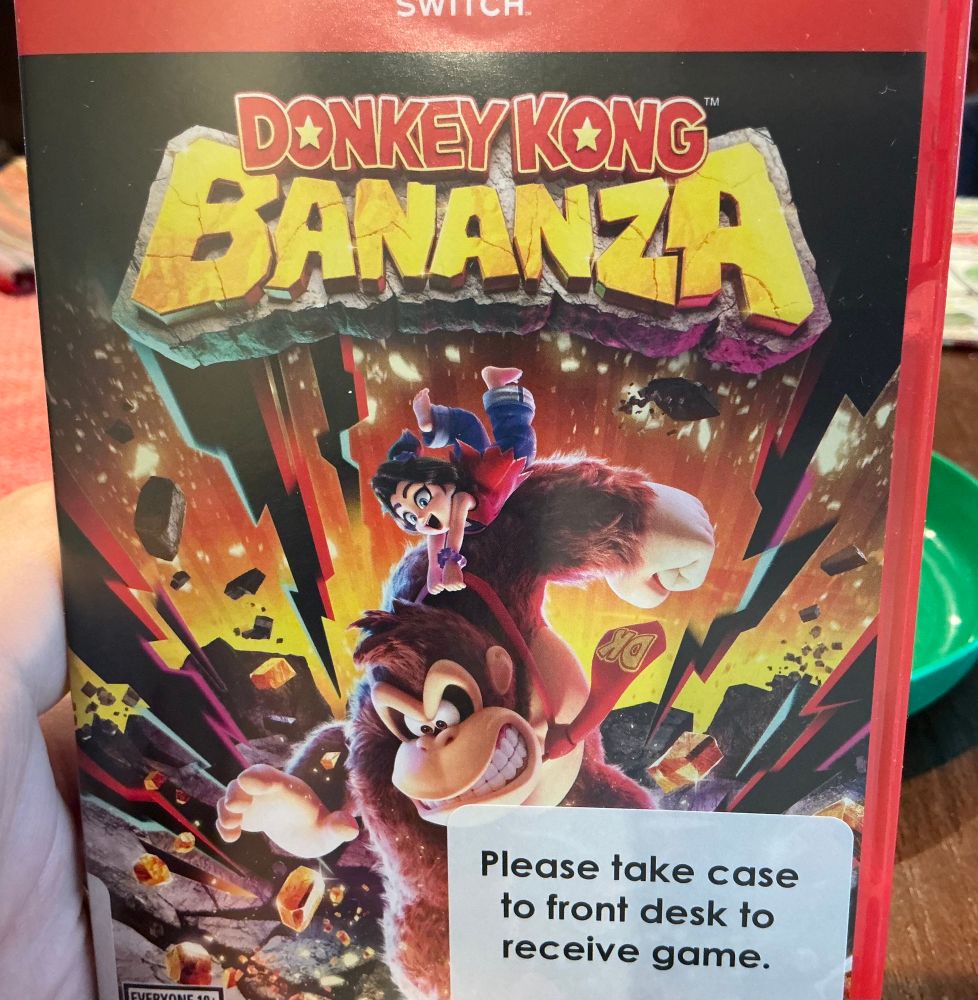 The cover of Donkey Kong Bananza for Switch 2, complete with library sticker.