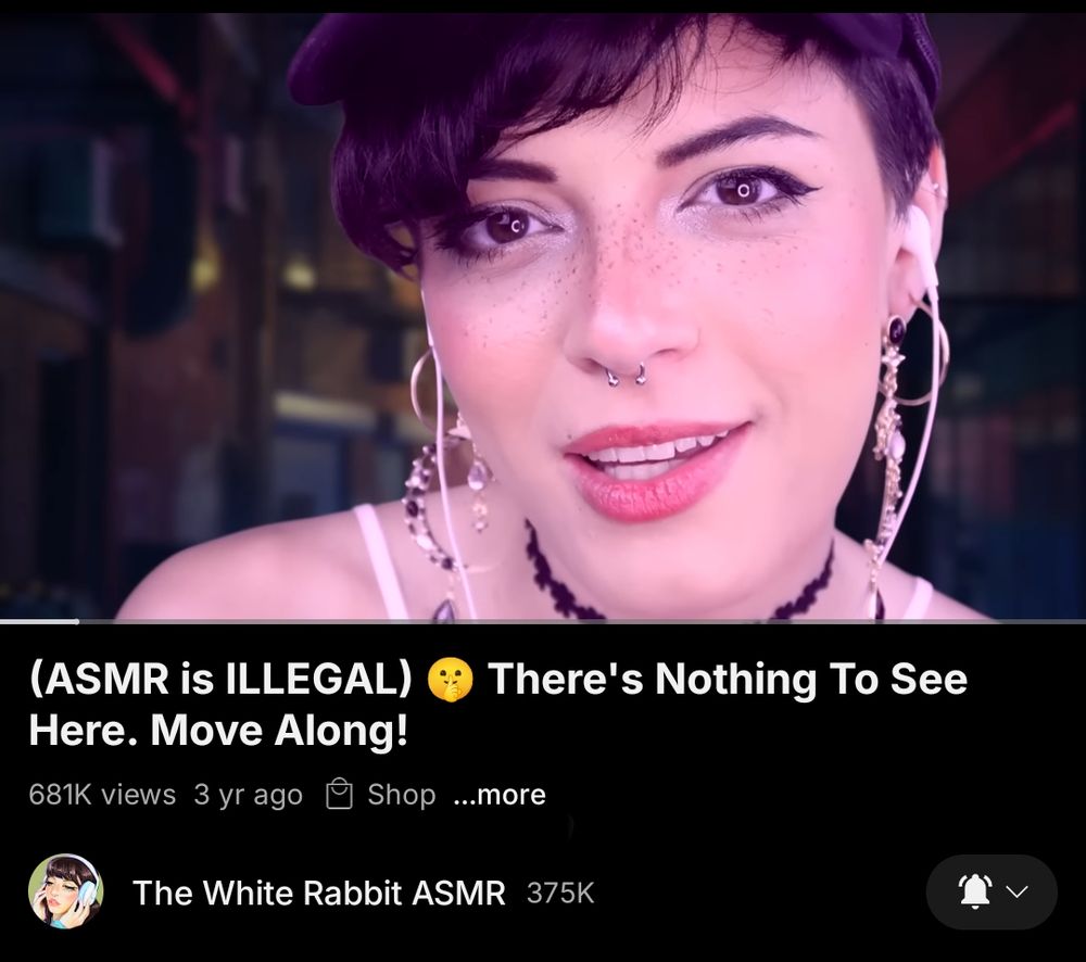 Screenshot of a YouTube video titled "(ASMR is ILLEGAL) There's nothing to see here. Move along!". The video was posted 3 years ago by a channel called 'The White Rabbit ASMR'