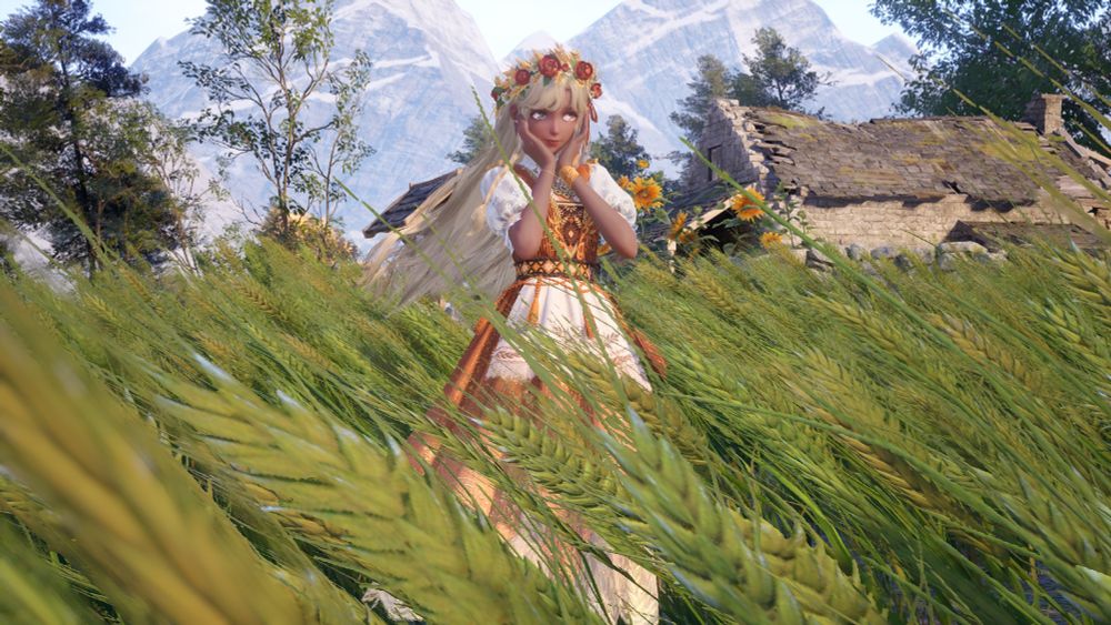 Nikki en robe orange, couronne de fleurs parmi les épis de blé