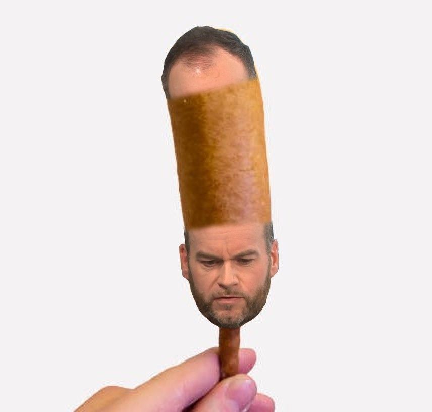 Brendan O'Neill's brobdingnagian bonce as a corndog