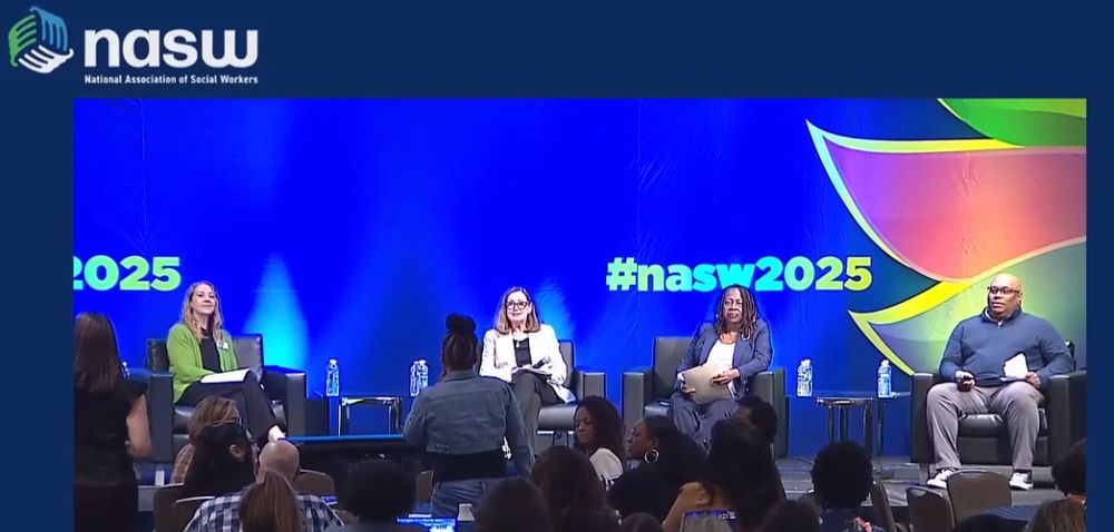panelists sitting in chairs