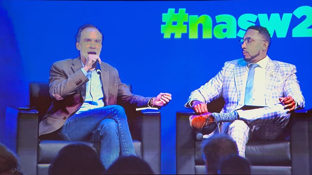 Eric Rice and Juan Rios sitting in chairs