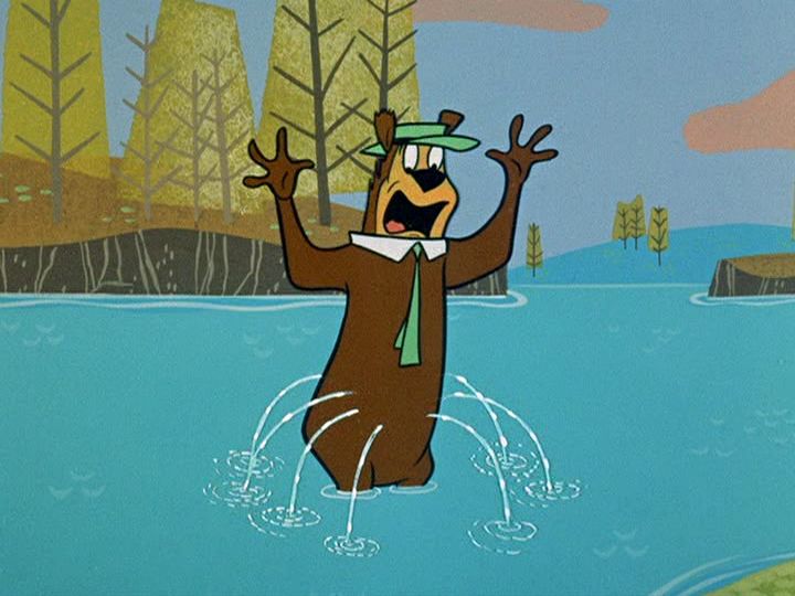Yogi Bear leaking water out of an array of holes around his midsection.