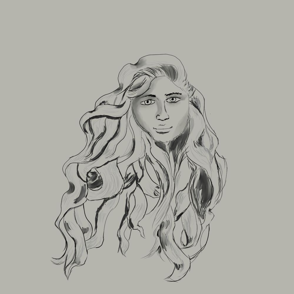 Person with long curly hair looking straight ahead.