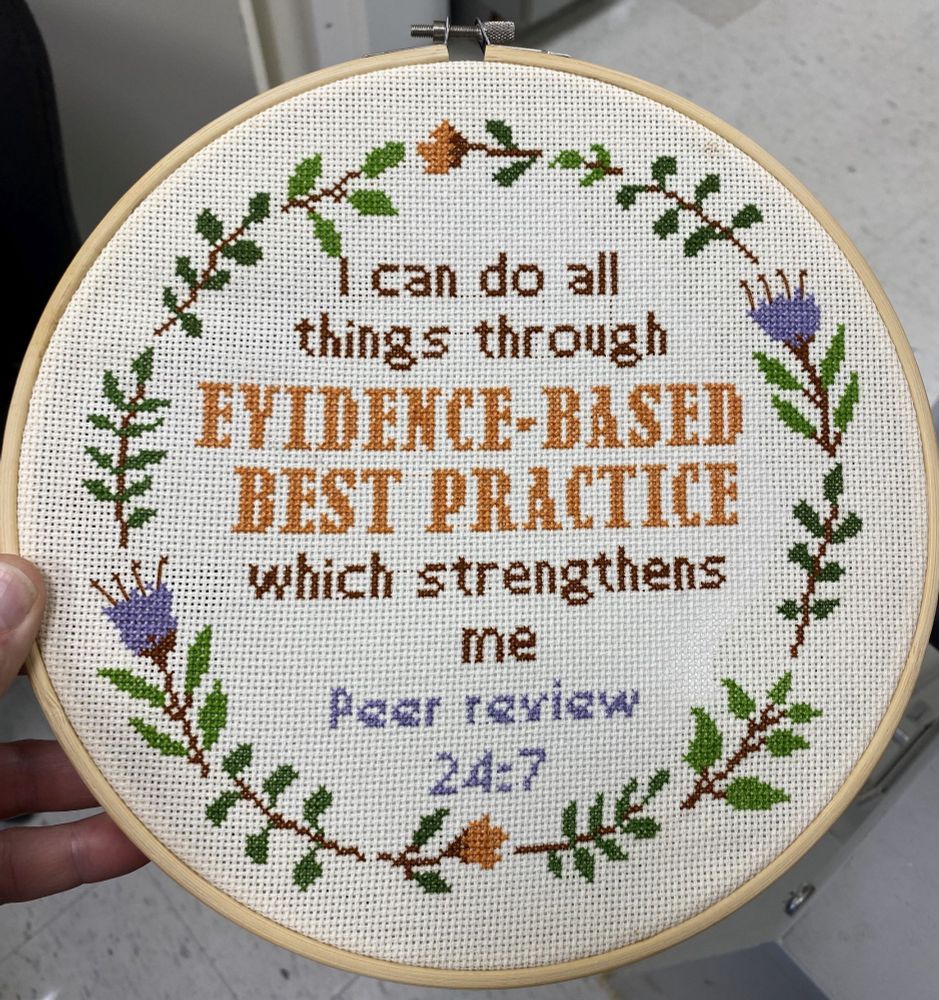 Cross-stitch reading "I can do all things through evidence-based best practice which strengthens me Peer Review 24:7"