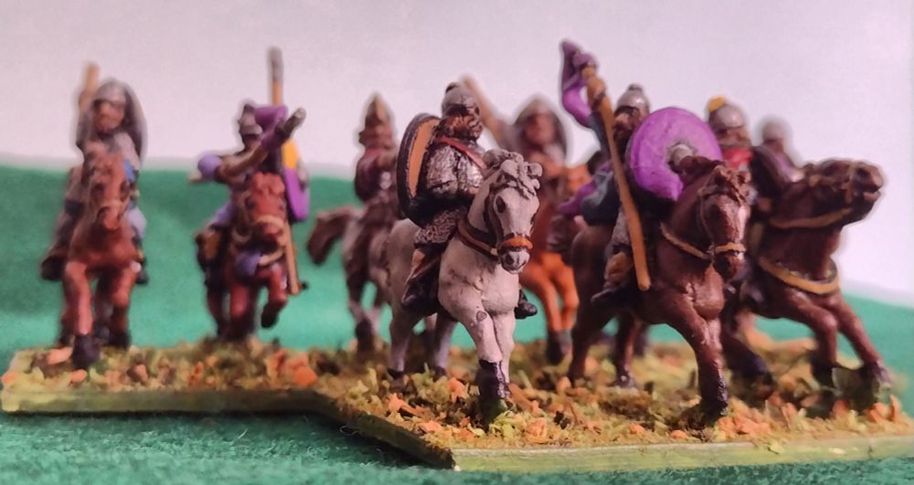 A group of early medieval heavy cavalry, 15mm figures, sculpted and cast by Essex Miniatures, painted and based by yours truly.