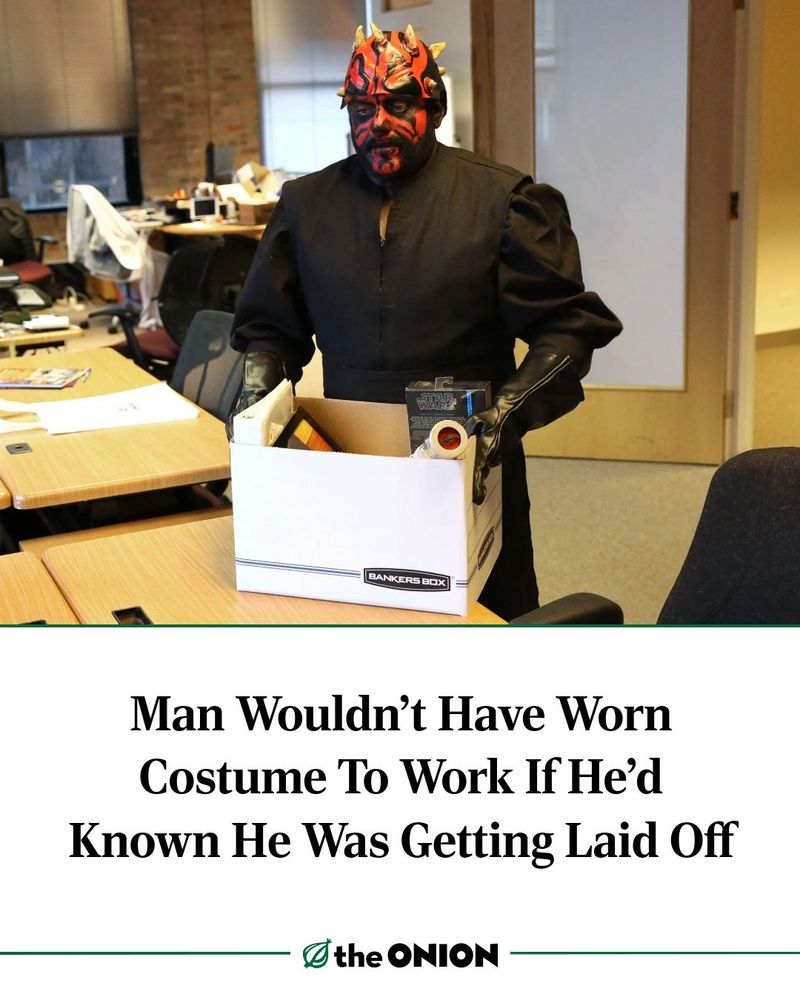 Image: employee dressed as Darth Maul, holding a box of items 
Words: Man Wouldn't Have Worn Costume To Work If He'd Known He Was Getting Laid Off