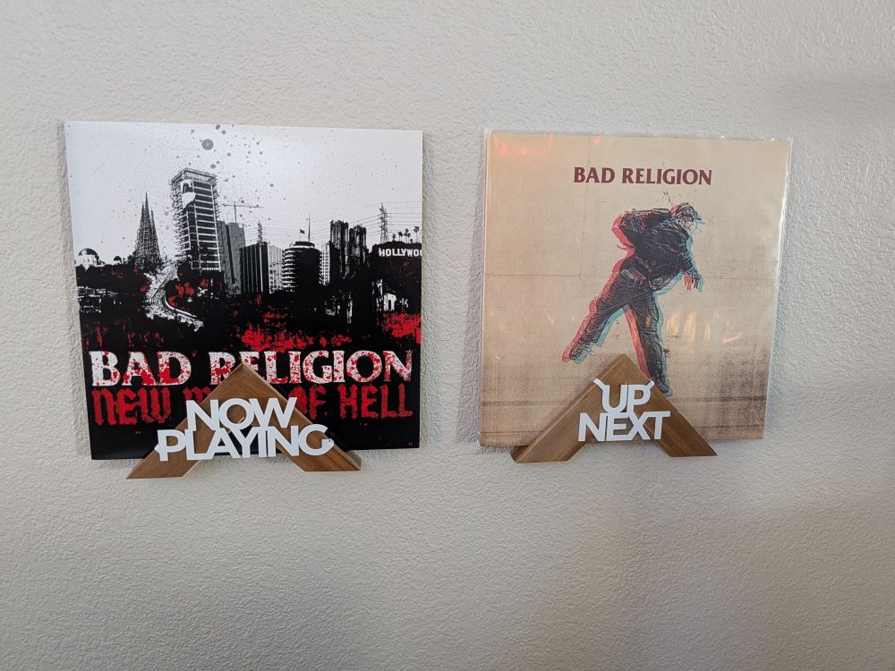 LPs of The New Maps of Hell and The Dissent of Man by Bad Religion