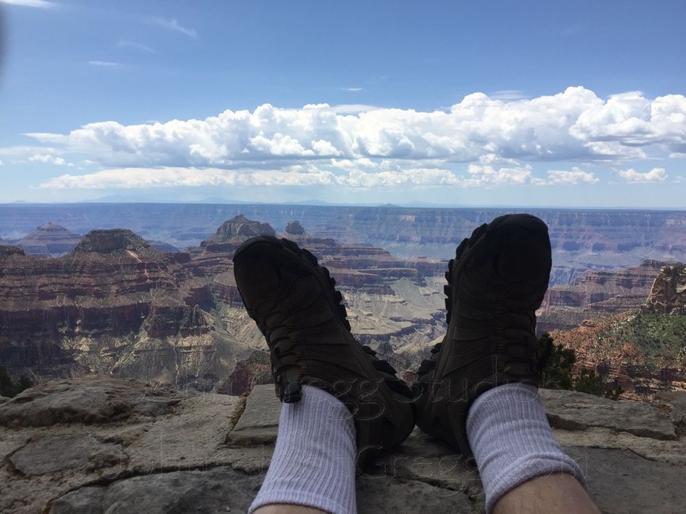 Boots on the North Rim is a photo I've been taking the same photo for years every time I stop at the North Rim Lodge. I took a photo of my boots on the wall of the lodge patio July 5 after breakfast at the lodge. There were big wooden chairs to sit in and look out towards the south rim.
We were camping during the thunder storm at Demotte Campground 4 of July weekend just outside North Rim entrance We saw the smoke on the 5 and the spotter plane came out but no water bombers There no such thing as a CONTROL BURN in the SUMMER TIME NEVER HOW STUPID ARE THEY  The North Rim lodge had water restrictions on July 5 and had closed the public bathrooms at the lodge putting portapotty in the parking lot. Any water to fight a fire would've had to come from the air.