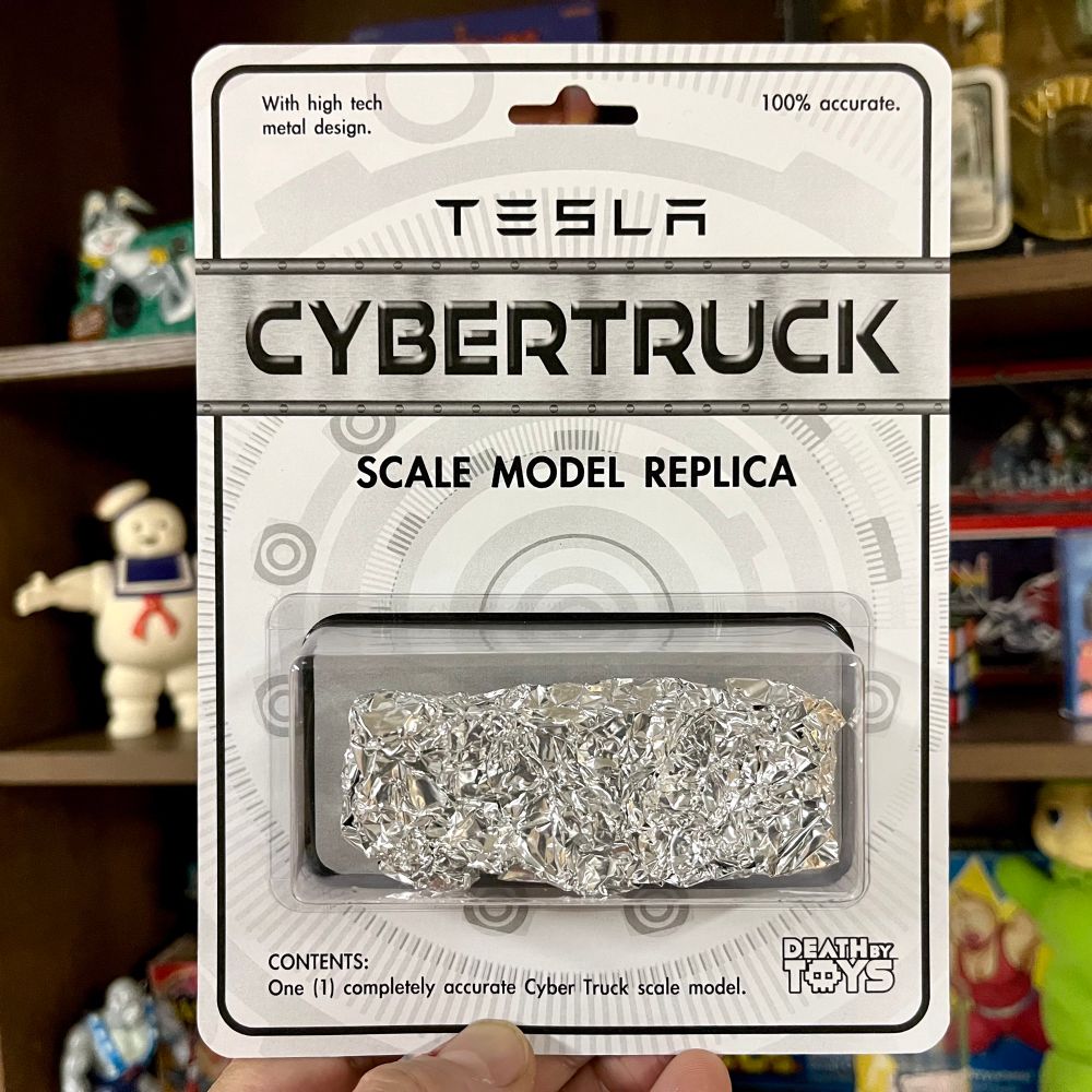 Mockup toy in a blister pack, consisting of crumpled aluminum foil.