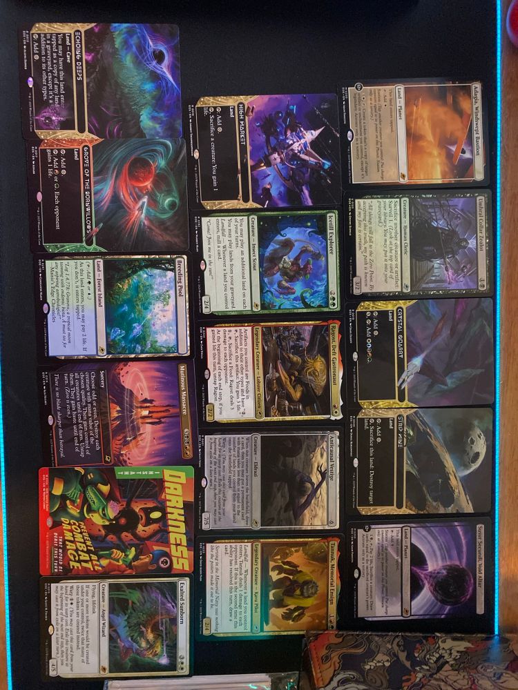 Image of several cards acting as highlight pulls from Red’s Edge of Eternity booster box