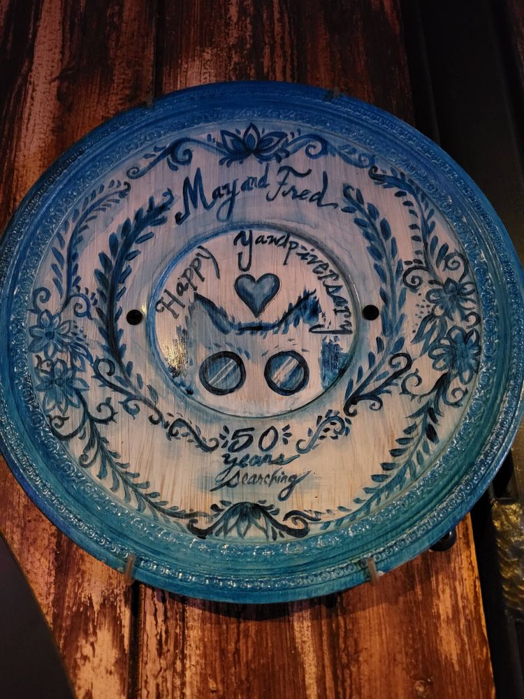 A plate commemorating 50 years of Mary and Fred searching for the Yalp