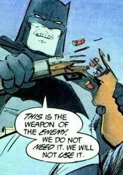 Batman snaps a shotgun in half and says,
"This is the weapon of the enemy. We do not need it. We will not use it."