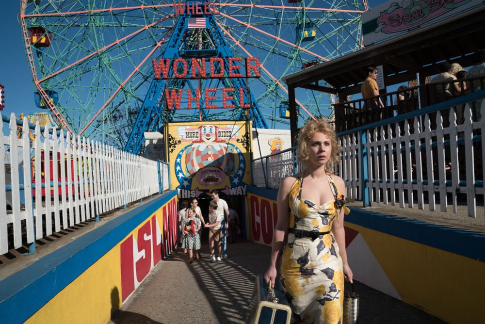 Four peoples' lives intertwine amid the hustle and bustle of the Coney Island amusement park in the 1950s: Ginny, an emotionally volatile former actress now working as a waitress in a clam house; Humpty, Ginny's rough-hewn carousel operator husband; Mickey, a handsome young lifeguard who dreams of becoming a playwright; and Carolina, Humpty's long-estranged daughter, who is now hiding out from gangsters at her father's apartment.