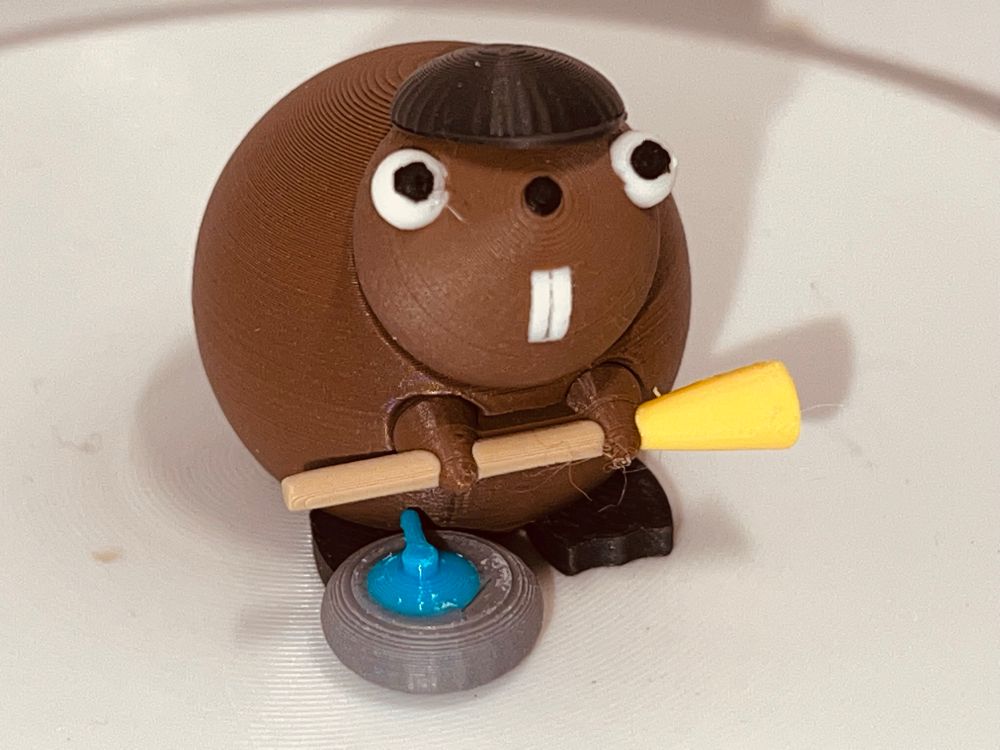 Buddy the Beaver is enjoying curling.