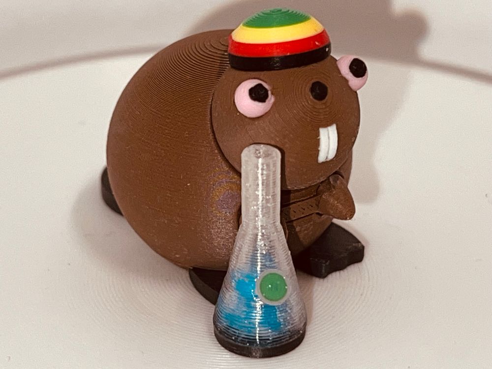 Buddy the Beaver relaxing with a bong.