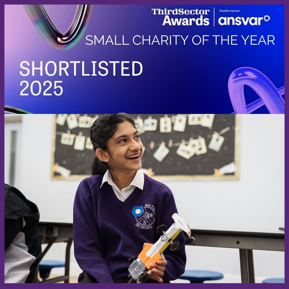 [Image Description]
A celebratory graphic split into two parts. The top half features a vibrant purple and blue banner announcing that a charity has been "SHORTLISTED 2025" for "Small Charity of the Year" in the Third Sector Awards, sponsored by Ansvar. The bottom half shows a joyful student in a purple school uniform (from “Watson School”) sitting in a classroom. She is smiling brightly while holding a small handmade model car, suggesting an engaging STEM-related activity. The atmosphere is lively and inspiring, emphasizing inclusion, education, and innovation.