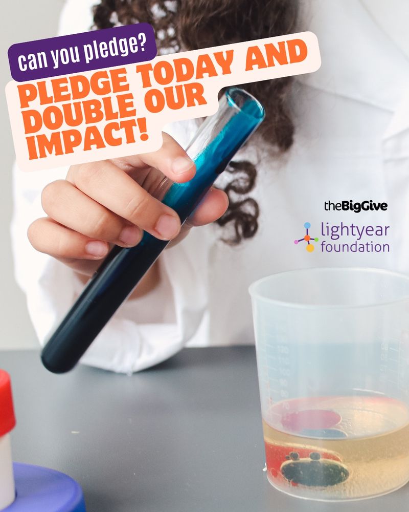 A child in a white lab coat holds a blue test tube over a measuring cup filled with yellow liquid and colorful objects. Overlaid text reads: “Can you pledge? Pledge today and double our impact!” Logos for The Big Give and Lightyear Foundation are visible in the corner.