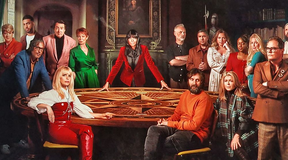 Celebrity Traitors photo with Jonathan Ross in pink.