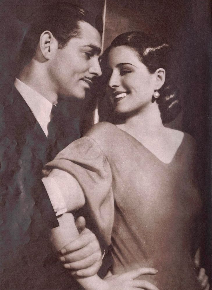 Glamour dual portrait of Gable and Shearer as “sophisticated, daring moderns.” 