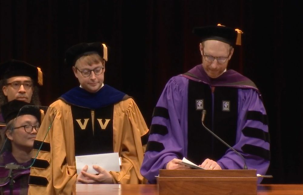 A picture of me looking very embarrassed as Dean McGeveran reads comments from the students.
